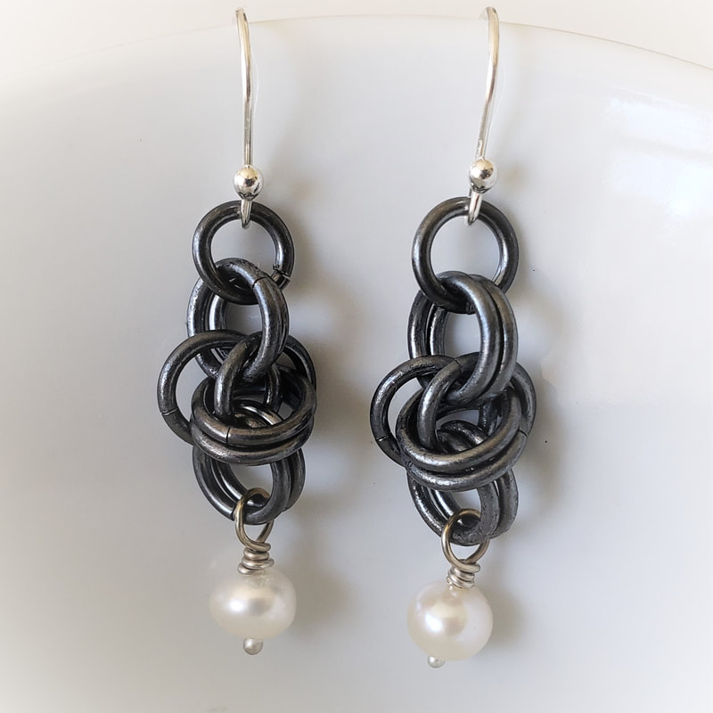 black earrings with freshwater pearls