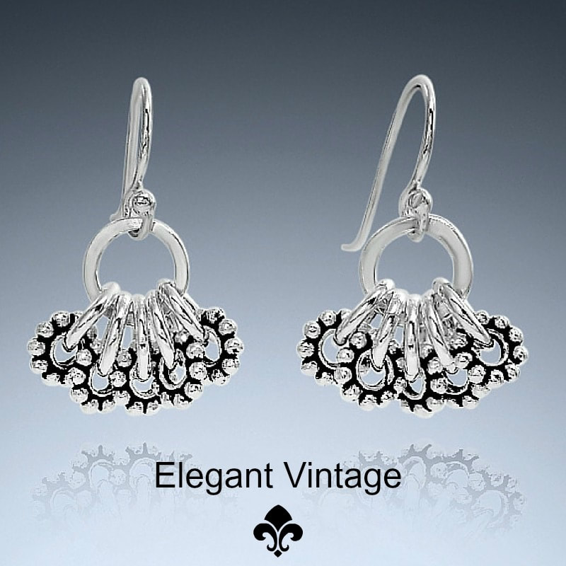 silver nature inspired clover earrings