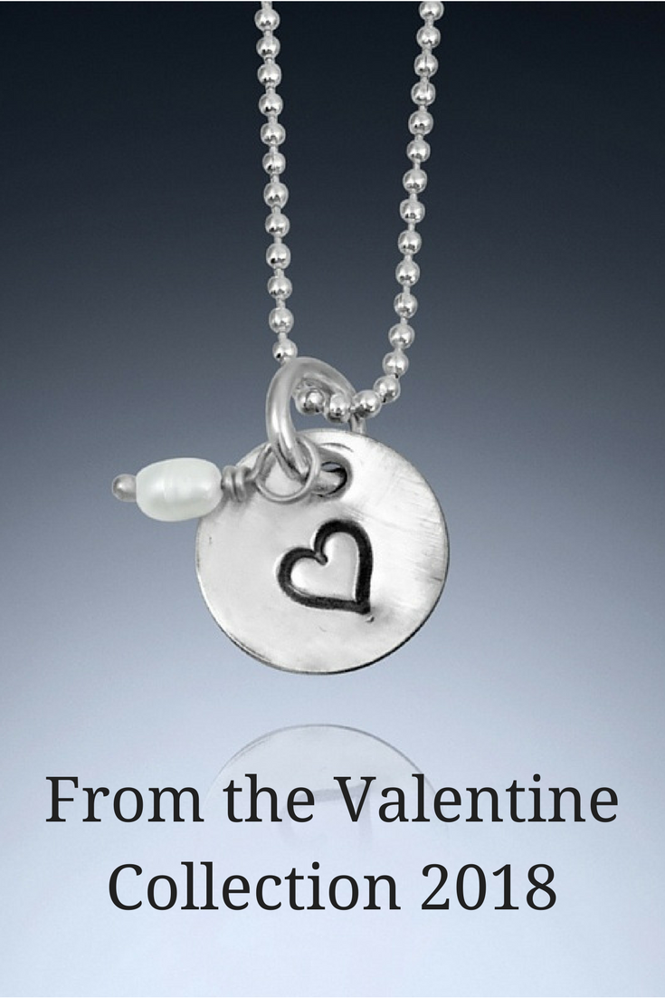 Small silver and pearl heart necklace